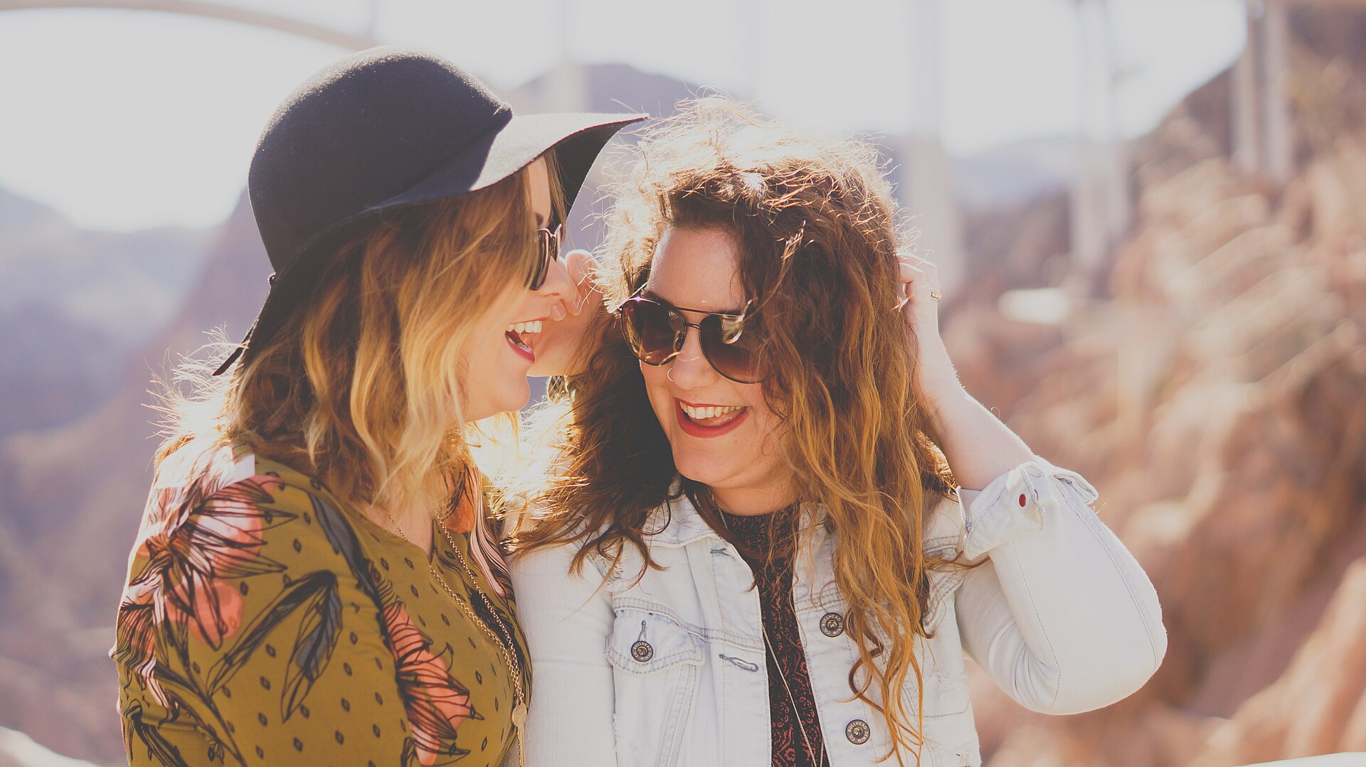Two friends talking outdoors