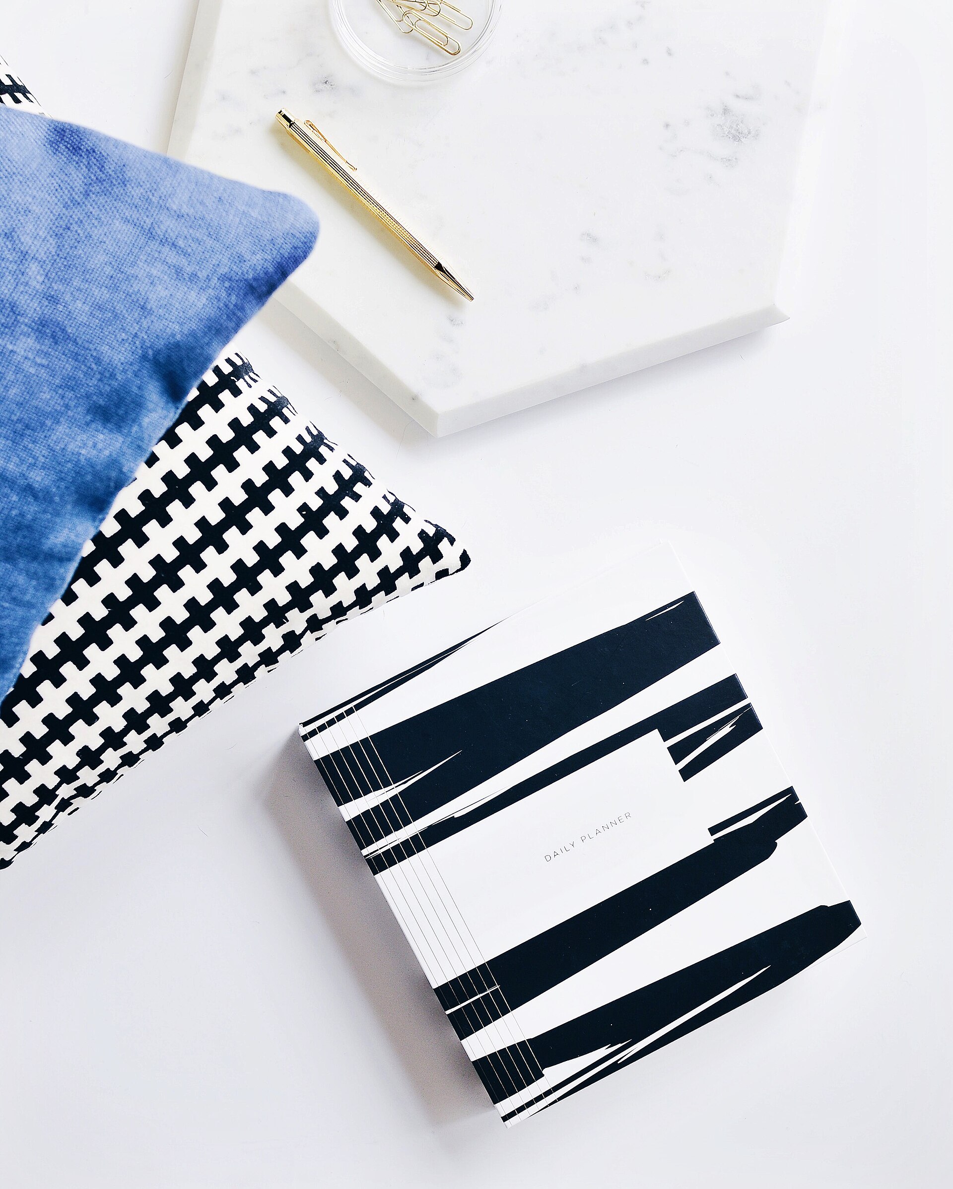 Planning notebooks with a bold black-and-white cover
