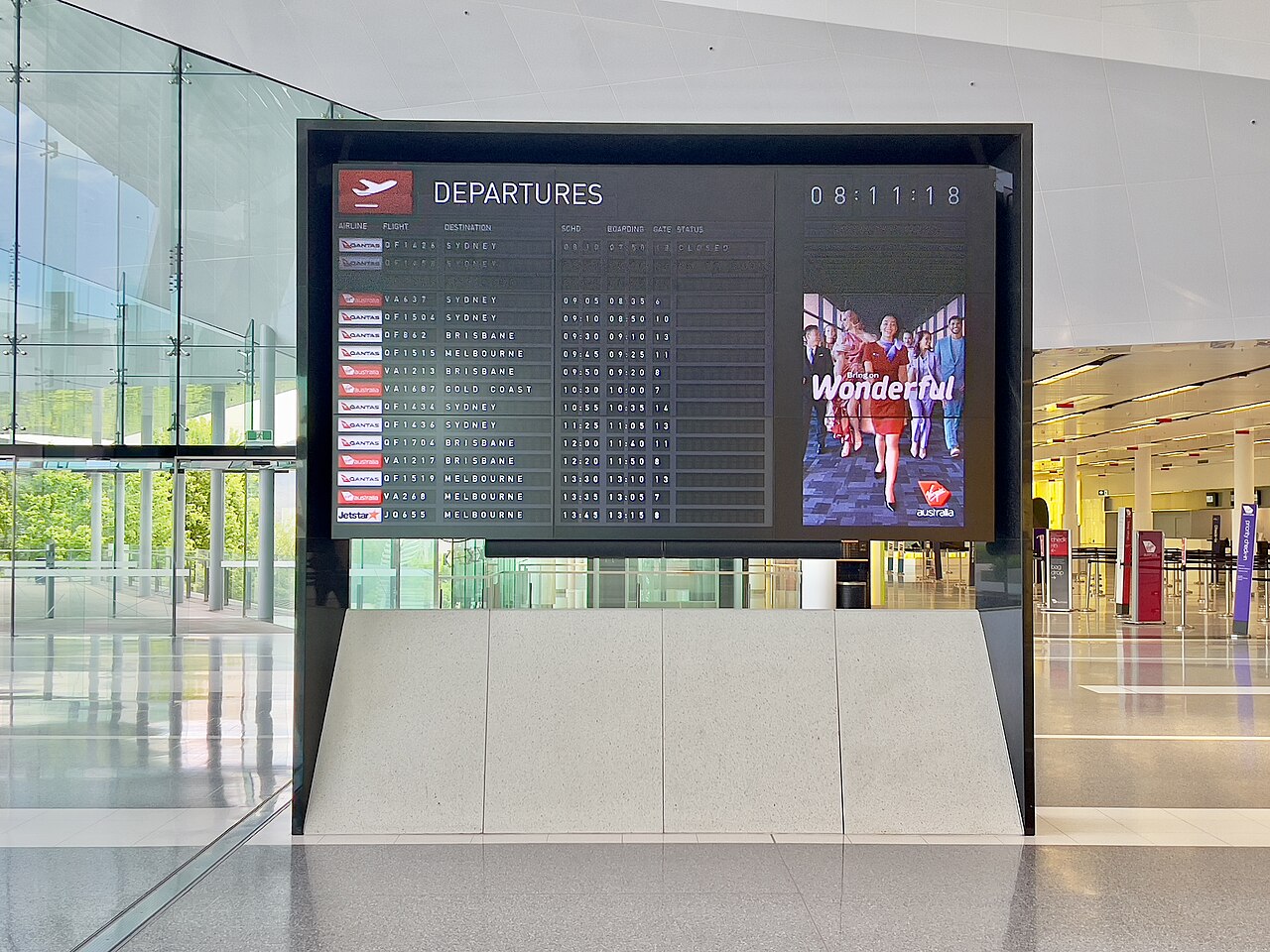 Flight departure board at Canberra Airport, November 2022